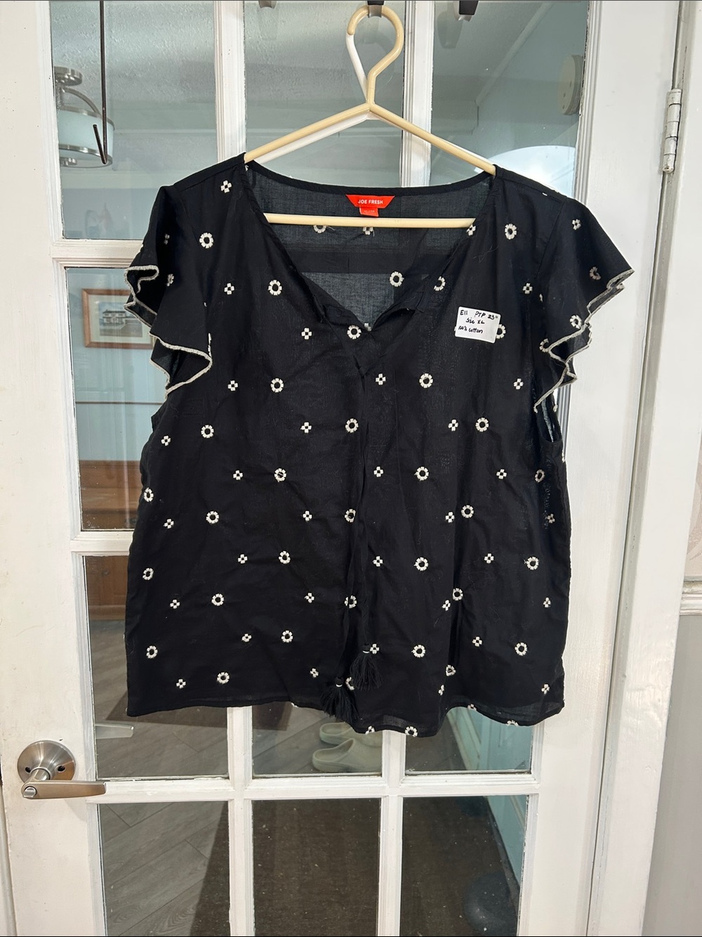 E11.    Joe Fresh Black V-Neck Flutter Sleeve Top with White Floral Embroidery
